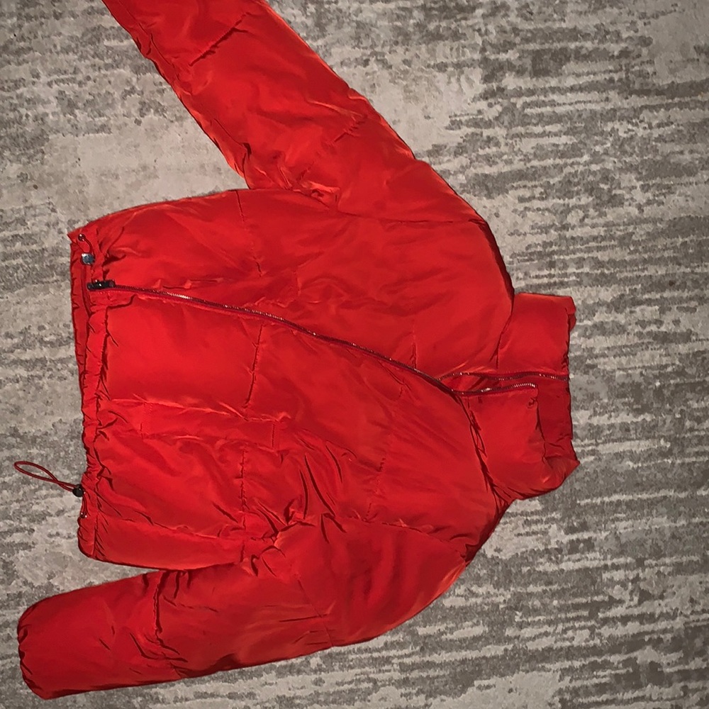 Red puffer coat